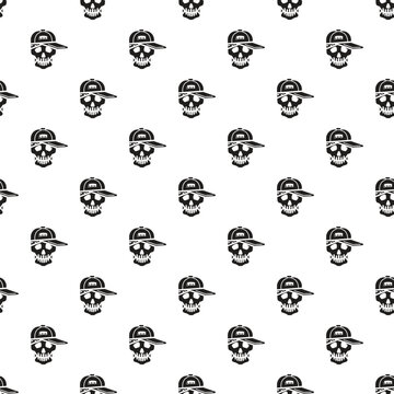 Repealing pattern with black skulls wearing backwards baseball caps on white