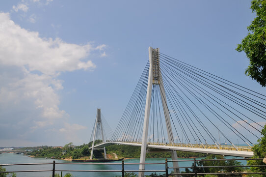 Batam, Indonesia - April 16, 2026: View of Barelang Bridge spanning the sea, connecting Batam, Rempang, and Galang islands.