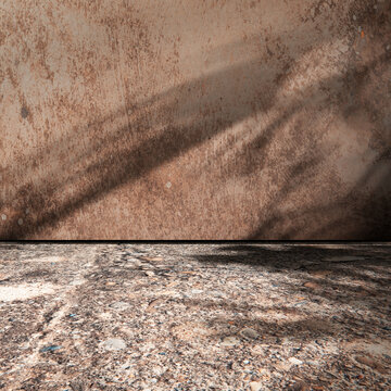 Muro de cemento desgastado y suelo de piedra rugosa que crean una textura r&uacute;stica e industrial con imperfecciones naturales.Muro de cemento rugoso sobre suelo de piedra texturizada