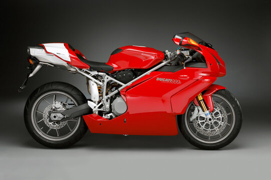 Bologna, Italy - May 05, 2004: Ducati 999s Testastretta, side view on gray gradient background