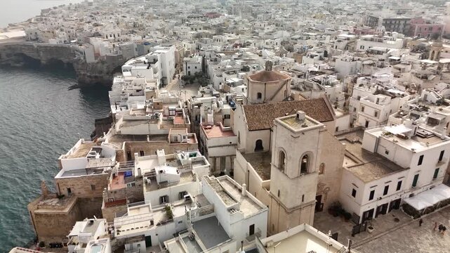 Aerial Drone View of Polignano a Mare Old Town and Cliffside Coast in Puglia, Italy