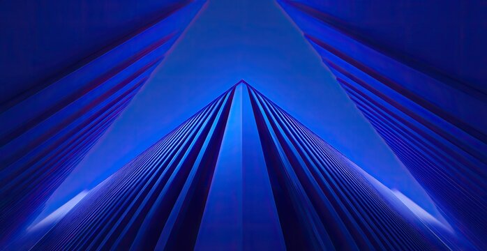 Abstract geometric blue architecture reaching upward towards light