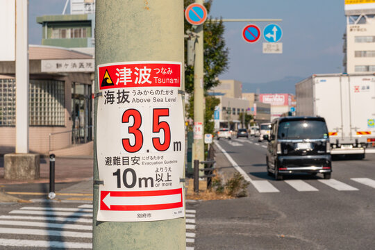 Evacuation Sign in Japan during natural disasters such as tsunami, earthquake and landslide.