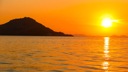 Fototapeta premium Komodo National Park: Rugged Savannas, Pink Beaches, and the Legendary Dragons