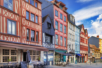 Fototapeta premium Traditional timber framed buildings on a street in Rouen, Normandy, France. Historic architecture and medieval facades