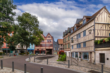 Obraz premium Traditional timber framed buildings on a street in Rouen, Normandy, France. Historic architecture and medieval facades