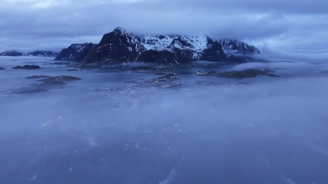 View of Henningsvaer during the winter with mountain in background