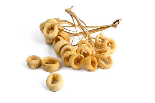 Lanting or Klanting is indonesian traditional snack. Made from cassava, salt,onion, spices and fried with coconut oil. Isolated on white background