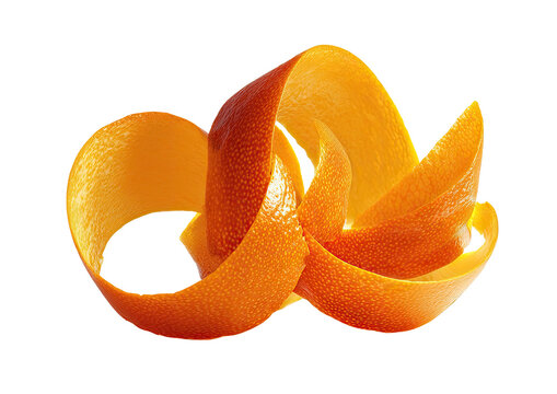 Close-up of orange citrus zest peel, curled into a decorative spiral against a black backdrop