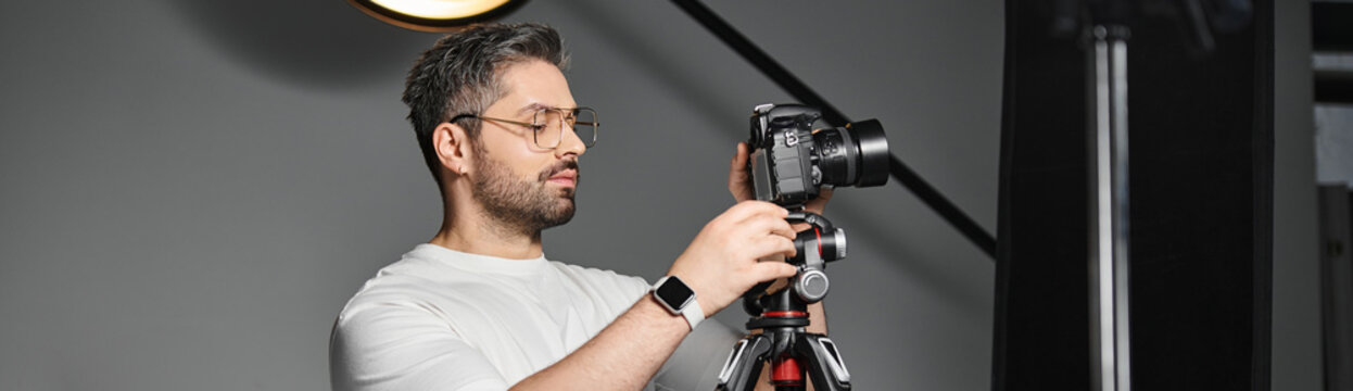 Professional photographer captures moments in a studio setup with a camera and tripod