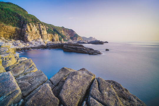 Longdong Bay Cape Coast Landscape - Northeast and Yilan Coast National Scenic Area. Long exposure at dawn, shot in Gongliao District, New Taipei, Taiwan.