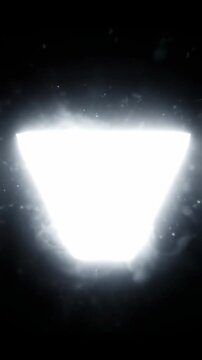Abstract Glowing Light shining in a dark void ideal for cinematic transitions Vertical. Video. Portrait Orientation.