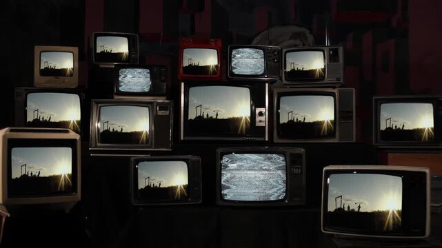 Retro TV Wall with Silhouette of Children Playing Football in Countryside - 4K