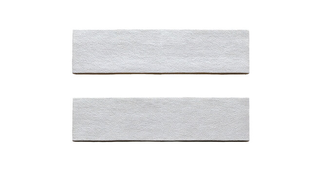 Two similar rectangular, white blocks with textured surfaces, placed one above the other
