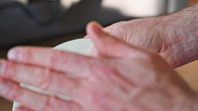 Slow Motion Video of Man Performing Thumb Roll on Tambourine Close Up