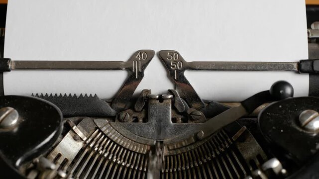 Typewriter Carriage with Blank Paper Sheet for Creative Writing