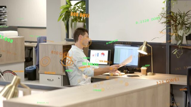 Man typing at dual screens overlaying finance charts, grabbing papers, heading to deliver report