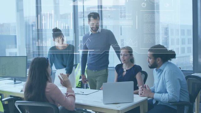 Five coworkers in business meeting, woman gesturing at laptop sparking HUD charts showing progress