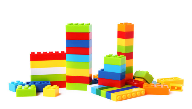 Construction toy. Colorful building blocks isolated on white