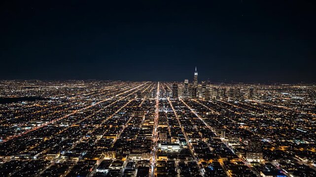 Aerial Night View of Chicago Cityscape, Sparkling Grid Streets and Willis Tower