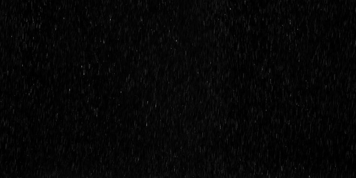 4k Rain over black background, realistic rain can be use in your composition, Rain hits the ground effect, Splashing rain