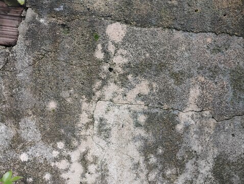 Textura de parede de cimento antiga, quebrada e manchada
