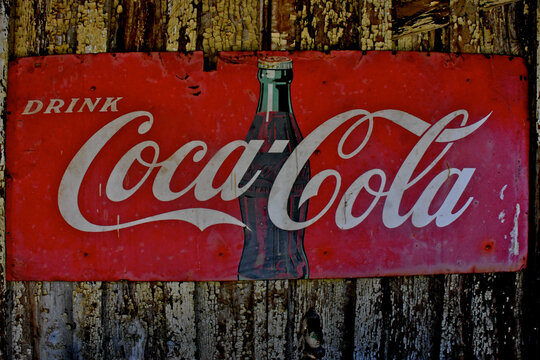 1930-1940&rsquo;s era rectangular metal Coca-Cola sign with tagline &ldquo;Drink Coca-Cola&rdquo;