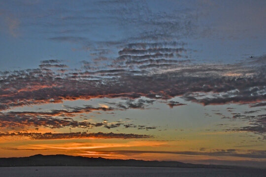 Stratocumulus clouds at sunset with the Santa Cruz Mountains in background 