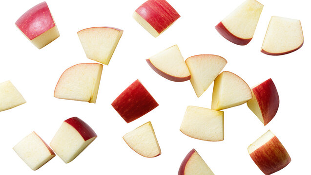Diced red apples with visible skin and flesh, isolated on transparent background