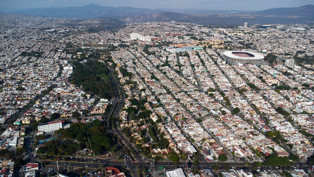 Urbanization in northern Guadalajara halted in the background by the Barranca de Huentit&aacute;n