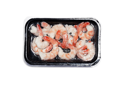Plastic package with frozen shrimps