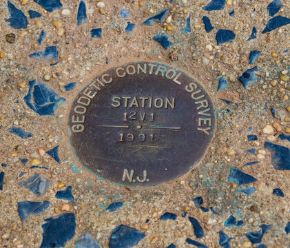 The marker is for a "GEODETIC CONTROL SURVEY" and identifies the specific "STATION 12V1".