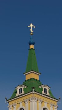 Religious tower imagery. Heritage monument showcasing detailed architectural and artistic craftsmanship. Old religious edifice featuring elaborate ornamentation and artistic architectural details