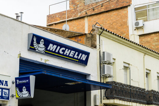 Barcelona, Spain - August 1, 2021. Logo and facade of Michelin, is a French company specialized in the manufacture of tires founded by the brothers &Eacute;douard Michelin and Andr&eacute; Michelin on May 28, 1889
