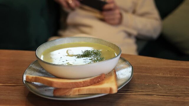A bowl of fresh noodle soup at a cafe.