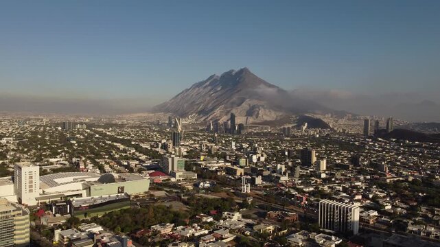 aerial view, drone footage, cerro de la silla, monterrey, nuevo leon, mexico, mountain, morning, daylight, cityscape, skyline, urban landscape, latin america, mexican city, landmark, iconic mountain, 