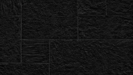 Dark stone wall with rough, uneven texture. Ideal for modern, urban, or industrial design projects....