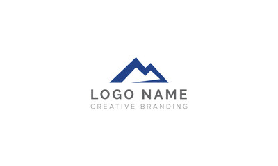 Fototapeta premium Minimalist mountain peak logo design using letter m with mountain, adventure