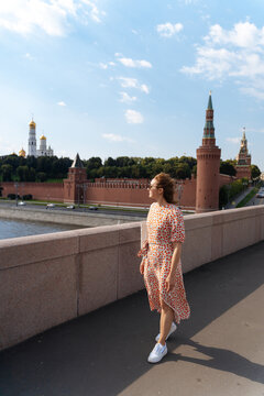 Young modern woman near Moscow Kremlin