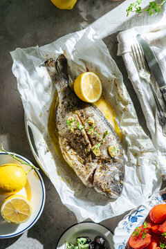 Cooked white fish on a tray