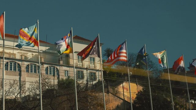 International country flags waving in lisbon city