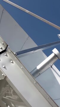 Vertical View of Large Satellite Dish Antenna for Telecommunications - 4K