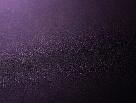 Top view of dark purple textured sandpaper surface with fine grain glitter effect