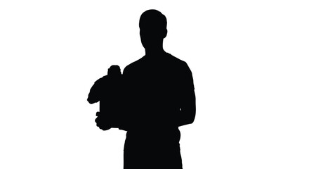 Father lovingly cradling a baby in a dark striking silhouette © Nazrul