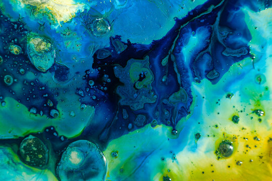 Colorful abstract design with blue and green shapes and patterns in a vibrant style
