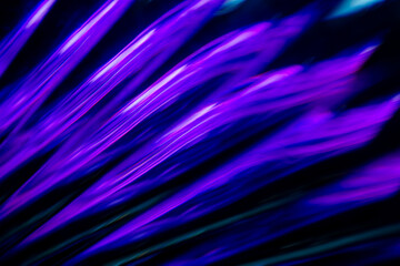 Deep purple diagonal abstract glowing neon light trails in dark space