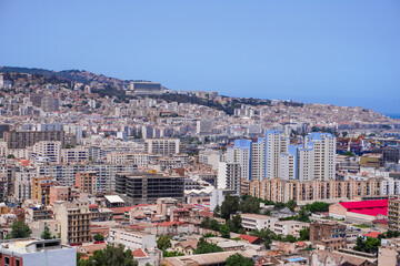 Fototapeta premium Alger the capital city of Algeria, North Africa, city centre of Algiers, the capital of Algeria, Landscape of Algiers city With port and mediterranean sea and white buildings, Arab Maghreb Africa.