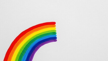 Fototapeta premium Simple drawing of a rainbow on a white background.