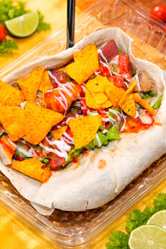 Loaded Tortilla Wrap with Crispy Chips and Spicy Sauce