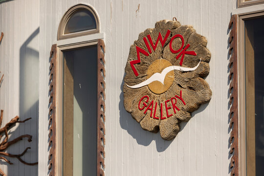Half Moon Bay, California, USA - October 31, 2025: Afternoon sun shines on the coastal Miwok Gallery near downtown.